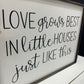 Love Grows Best In Little Houses Just Like This Framed Wood Sign