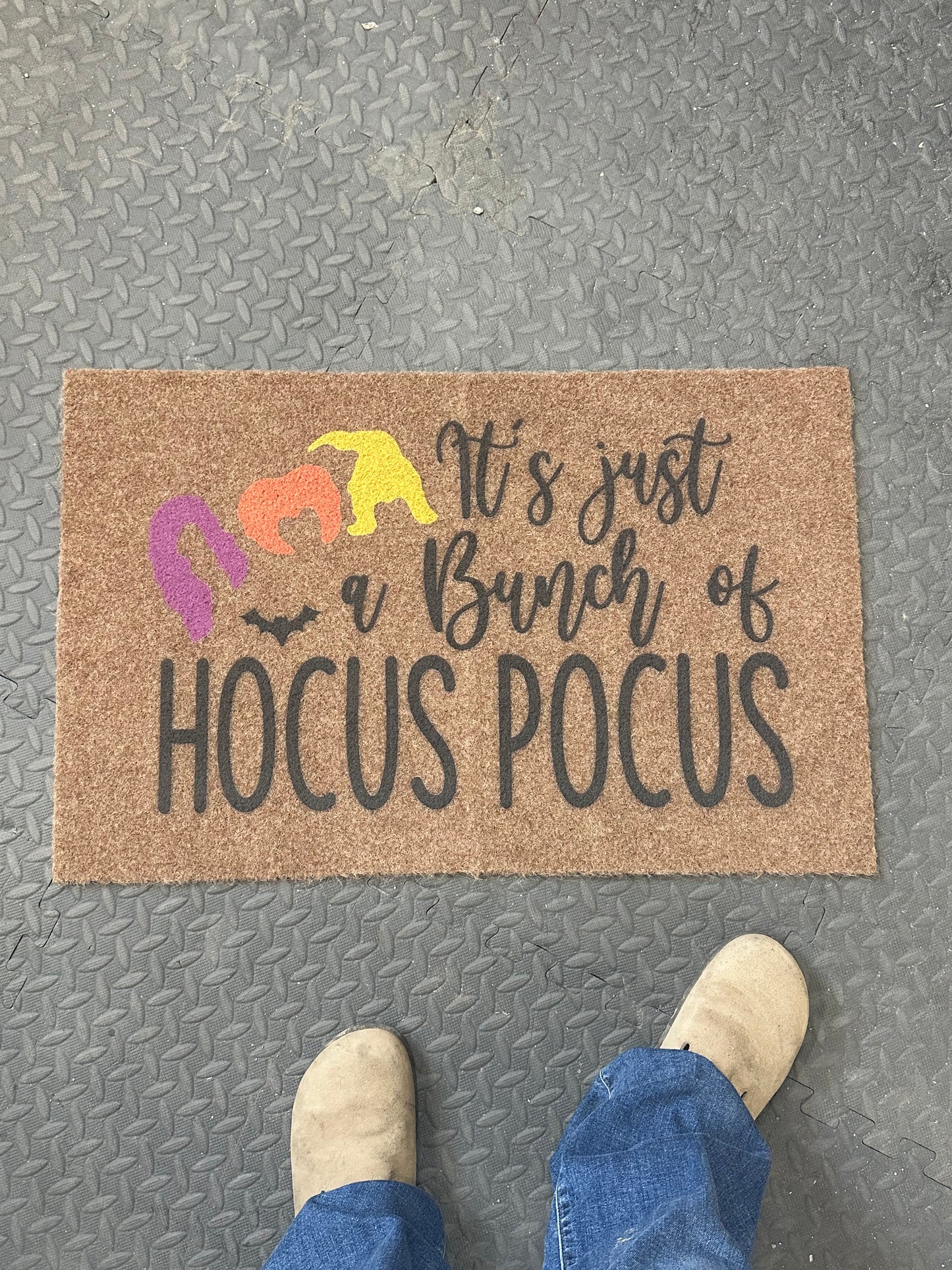 Its just a bunch of hocus pocus halloween door mat