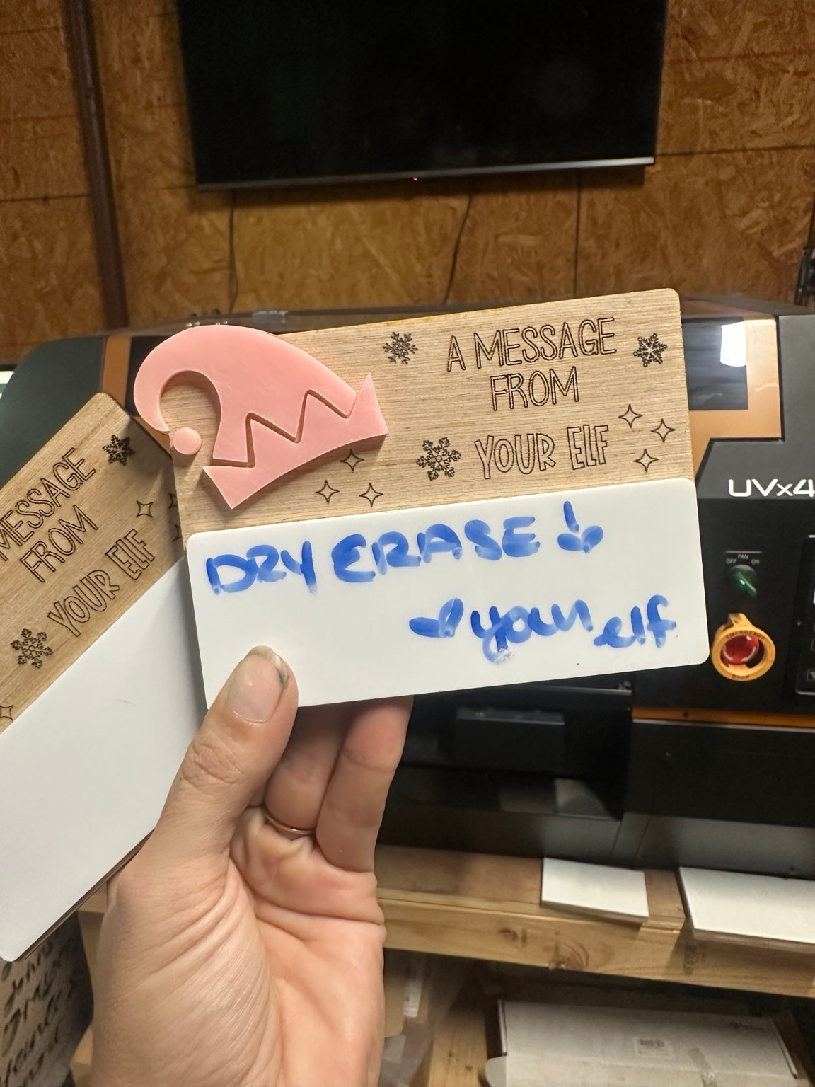 Pink Message From Your Elf dry erase board showing sample message