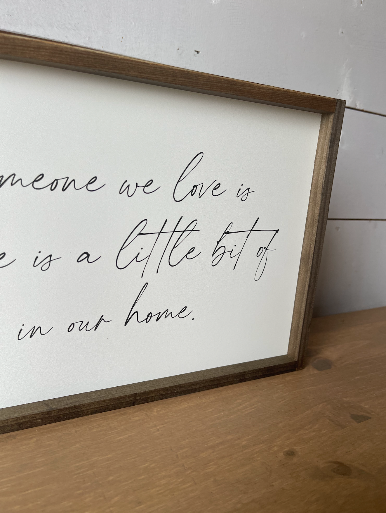 Because Someone is in Heaven, theres a little bit of heaven in our home Cursive wood sign